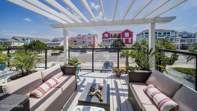 balcony featuring an outdoor hangout area and a pergola