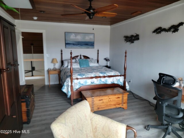 bedroom featuring wood ceiling, hardwood / wood-style flooring, access to exterior, and ceiling fan