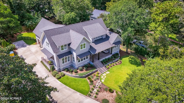 6404 Westport Dr, Wilmington, NC 28409 - aerial view of property and surrounding area with a tree filled landscape