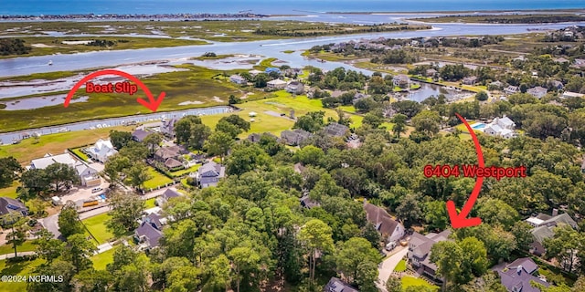 6404 Westport Dr, Wilmington, NC 28409 - aerial overview of property's location with a large body of water and nearby suburban area
