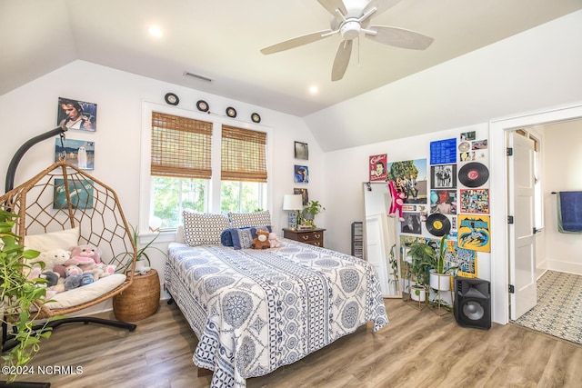 6404 Westport Dr, Wilmington, NC 28409 - bedroom with vaulted ceiling, wood finished floors, ceiling fan, and recessed lighting
