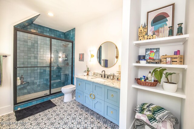 6404 Westport Dr, Wilmington, NC 28409 - full bath with a shower stall, vanity, toilet, and recessed lighting