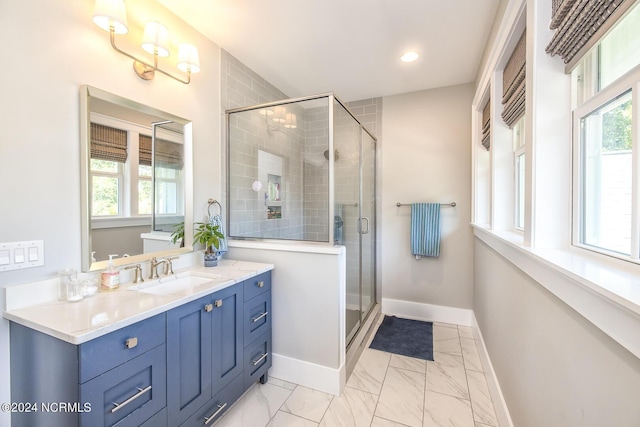 6404 Westport Dr, Wilmington, NC 28409 - bathroom with vanity, a shower stall, baseboards, marble look tile flooring, and recessed lighting