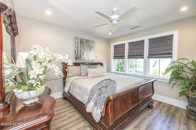 6404 Westport Dr, Wilmington, NC 28409 - bedroom featuring baseboards, wood finished floors, recessed lighting, and ceiling fan