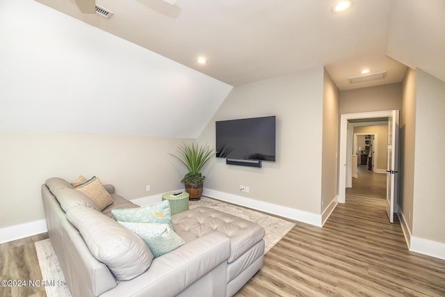 6404 Westport Dr, Wilmington, NC 28409 - living area with baseboards, vaulted ceiling, light wood finished floors, attic access, and recessed lighting