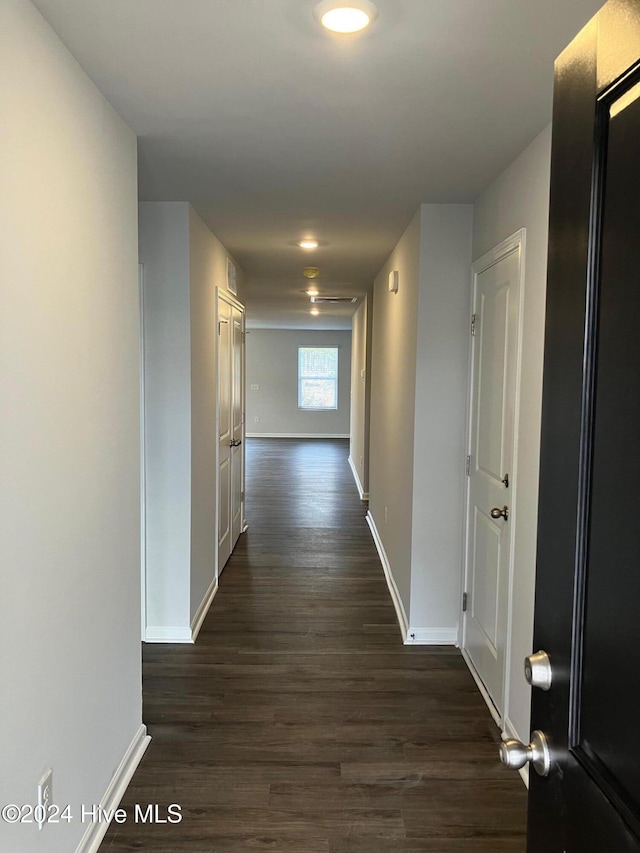 hall featuring dark hardwood / wood-style floors