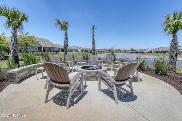 view of patio featuring an outdoor fire pit