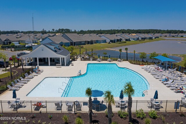 view of pool featuring a patio area