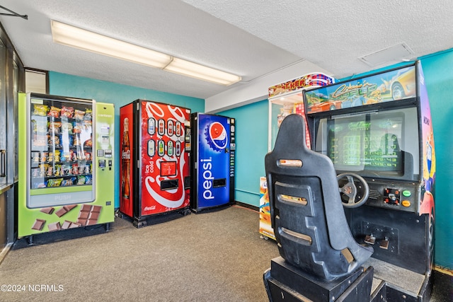 recreation room with visible vents and a textured ceiling