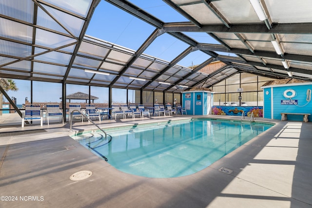 view of pool with a lanai