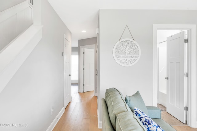 corridor featuring light hardwood / wood-style flooring