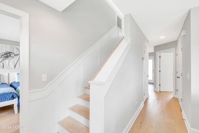 stairway with wood-type flooring