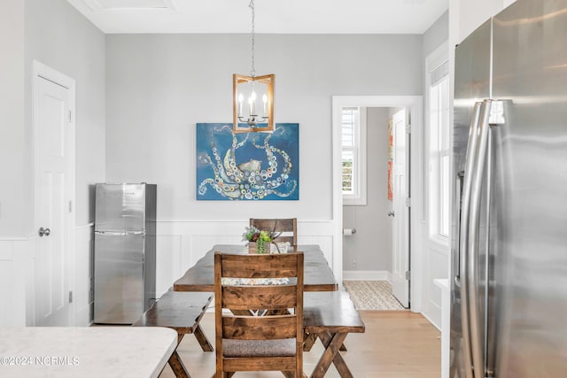 dining space featuring light hardwood / wood-style floors