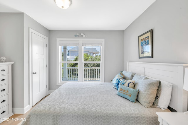 bedroom with light wood-type flooring