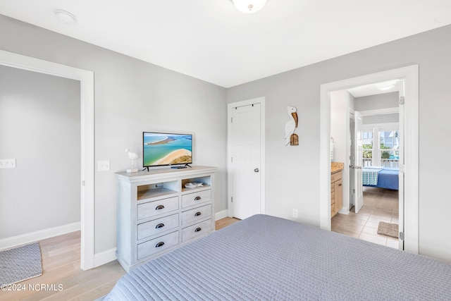 bedroom featuring light hardwood / wood-style floors