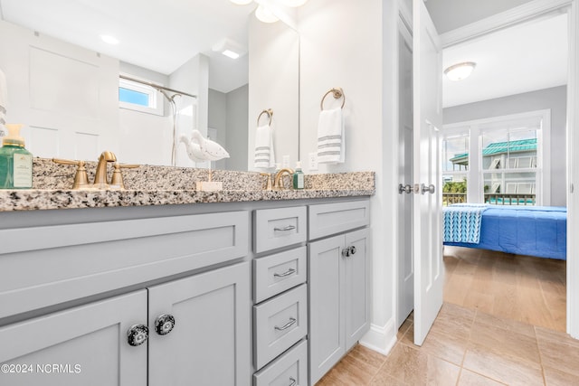 bathroom featuring wood-type flooring, vanity, and a shower with shower curtain