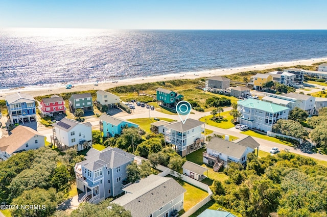 drone / aerial view with a view of the beach and a water view