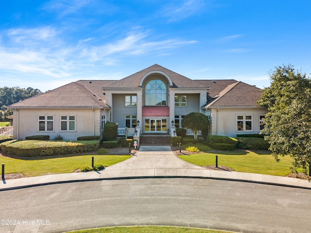 view of front of home with a front lawn