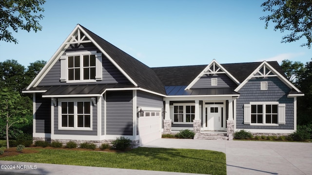 view of front of house featuring metal roof, driveway, and a standing seam roof