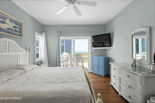 bedroom featuring hardwood / wood-style flooring, access to exterior, and ceiling fan