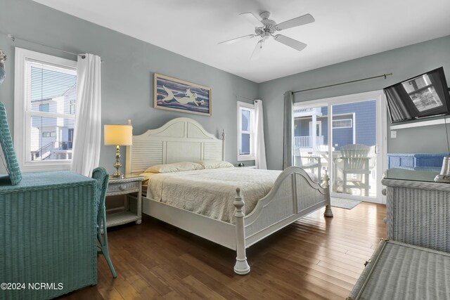 bedroom with ceiling fan, dark hardwood / wood-style flooring, and access to outside