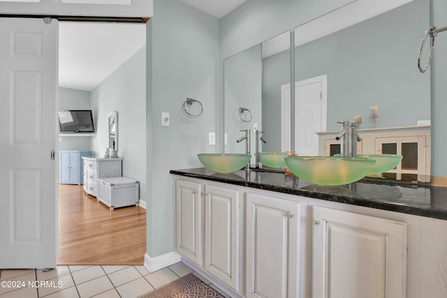 bathroom with vanity and tile patterned floors