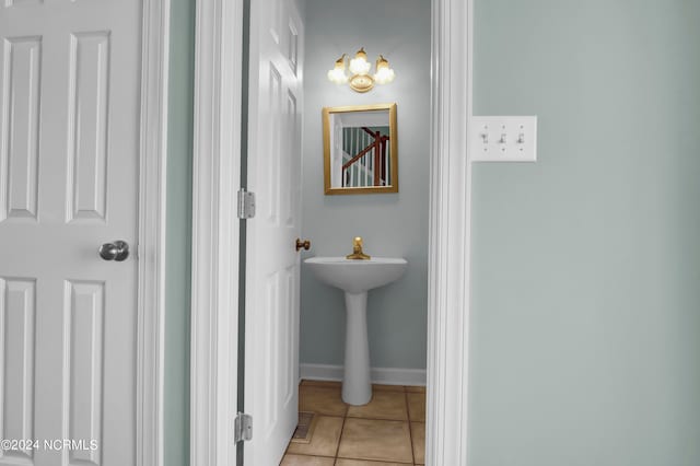 bathroom with tile patterned flooring