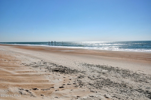 property view of water featuring a view of the beach