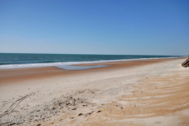 view of water feature featuring a beach view