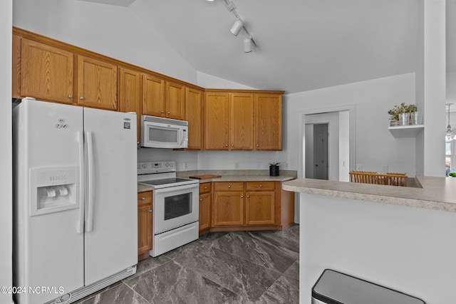 kitchen with lofted ceiling, white appliances, and rail lighting