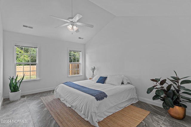 bedroom with lofted ceiling and ceiling fan