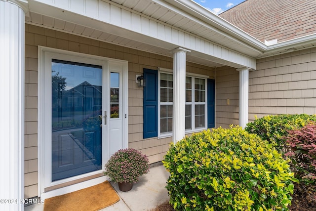 doorway to property featuring a porch