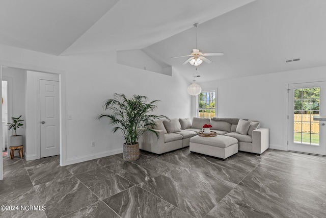 living room featuring ceiling fan and high vaulted ceiling