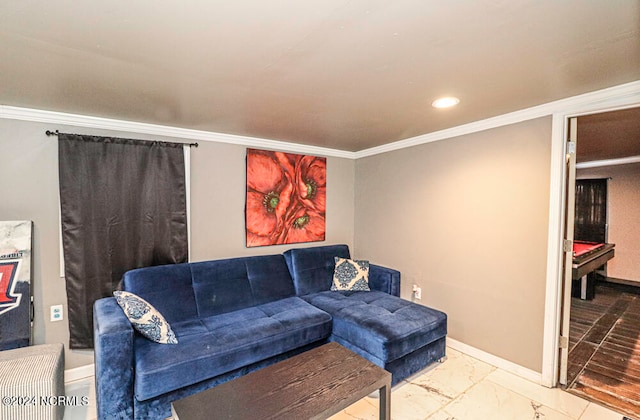 living room featuring crown molding