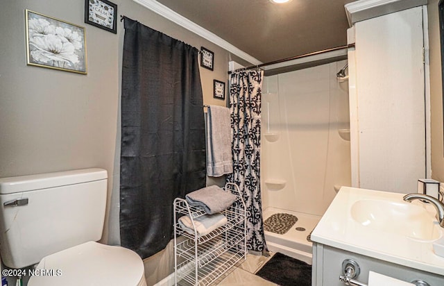 bathroom featuring vanity, toilet, ornamental molding, and walk in shower