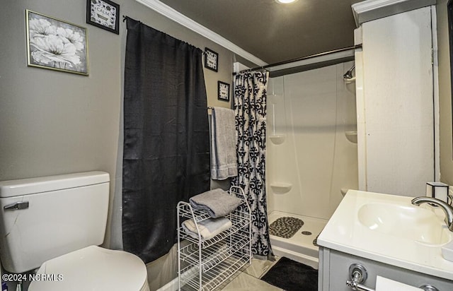 full bath with toilet, a stall shower, ornamental molding, and vanity