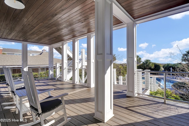 sunroom with wooden ceiling