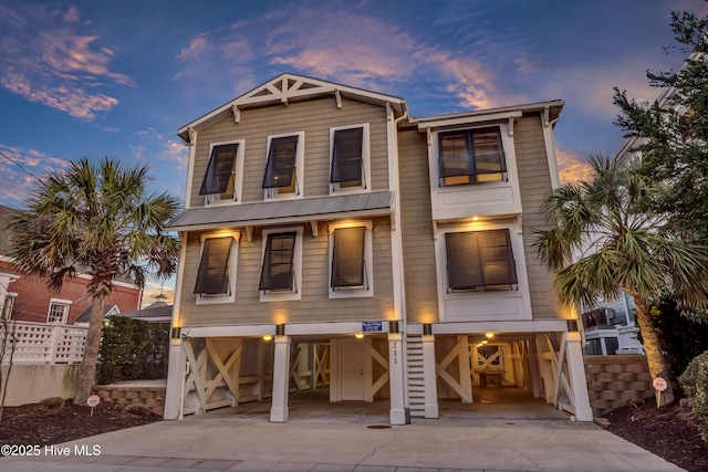 coastal inspired home with a carport