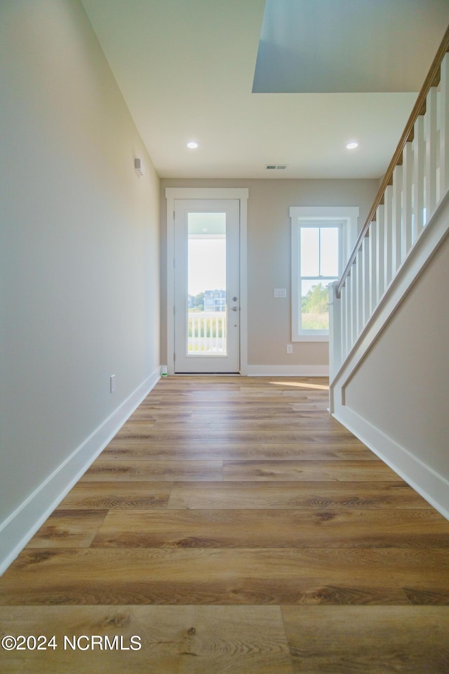 interior space with hardwood / wood-style flooring