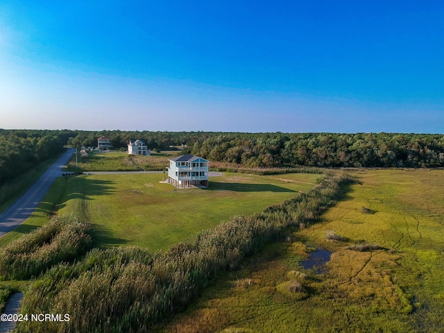 birds eye view of property featuring a rural view