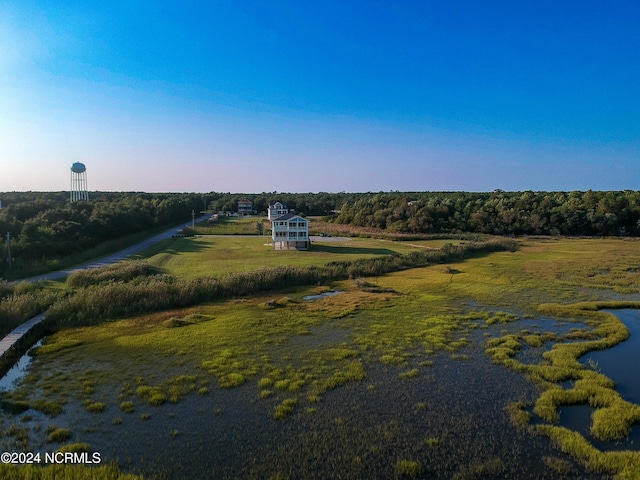 birds eye view of property featuring a rural view