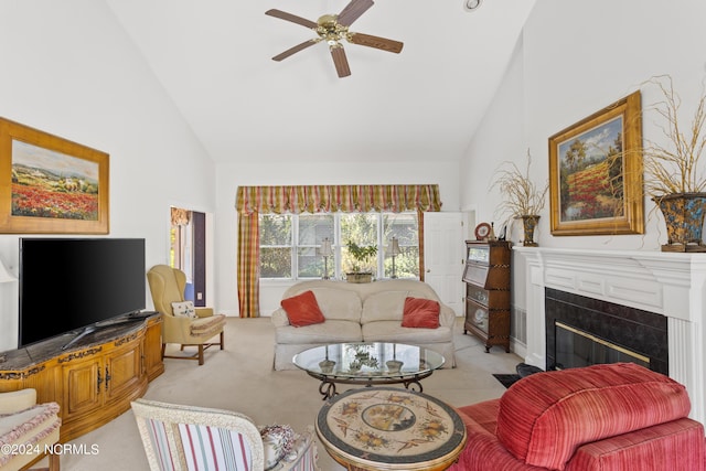 carpeted living room featuring high vaulted ceiling and ceiling fan