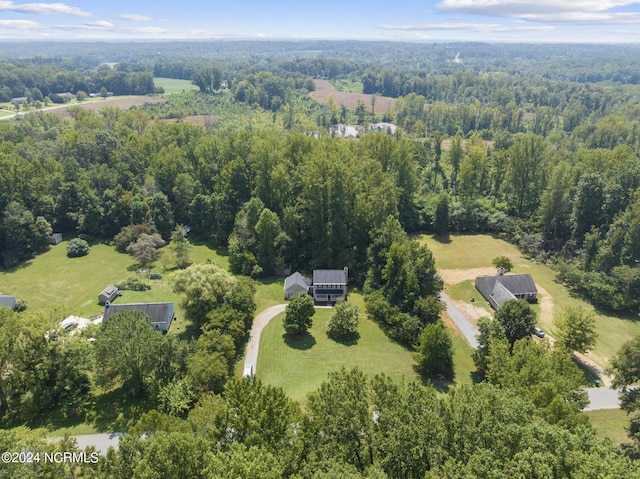 bird's eye view featuring a view of trees