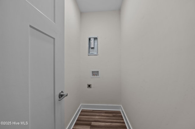 clothes washing area featuring washer hookup, electric dryer hookup, and dark wood-type flooring