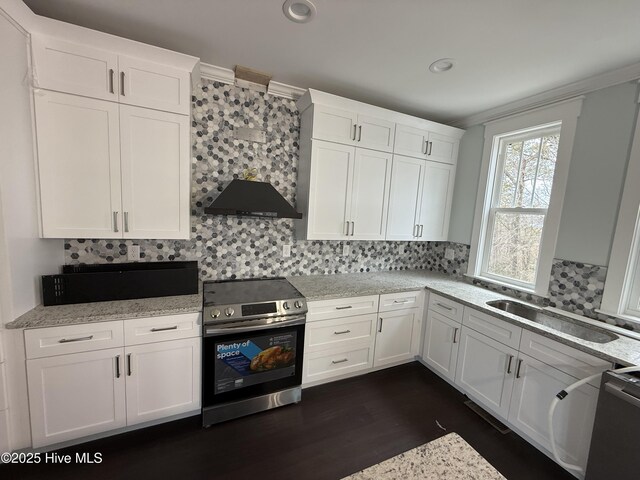 unfurnished room featuring plenty of natural light