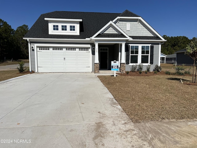 craftsman house featuring a garage