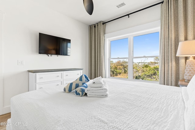 bedroom featuring visible vents and a ceiling fan