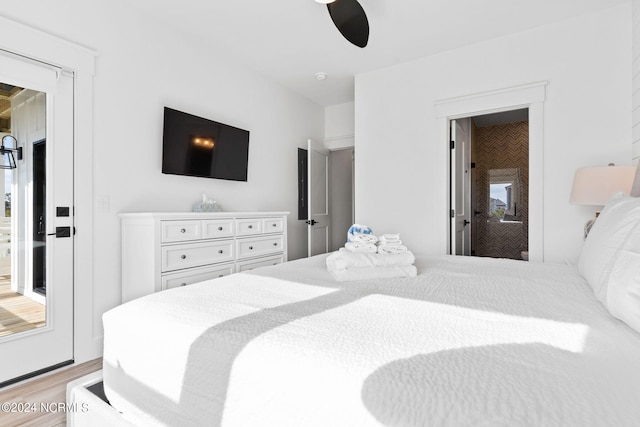 bedroom featuring light wood-style floors and ceiling fan