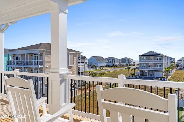 balcony featuring a residential view