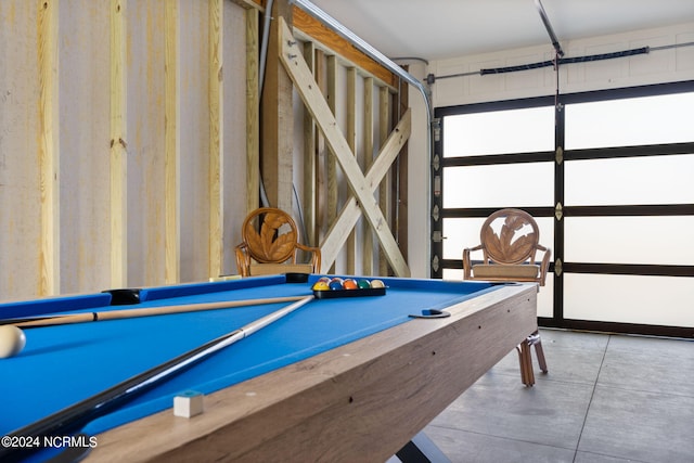 game room with concrete floors and billiards